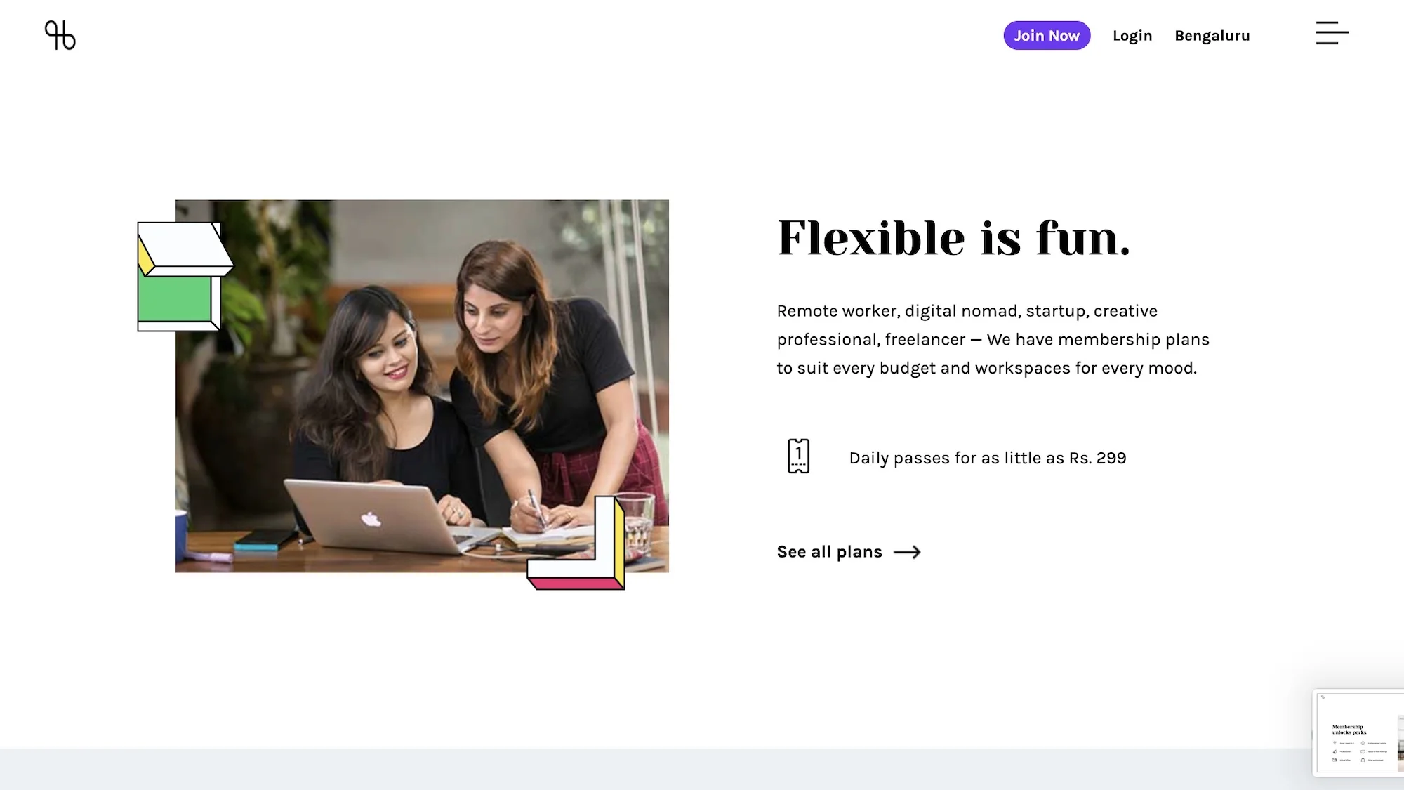 Flexible is fun: two women working together on a laptop, with daily passes from Rs. 299