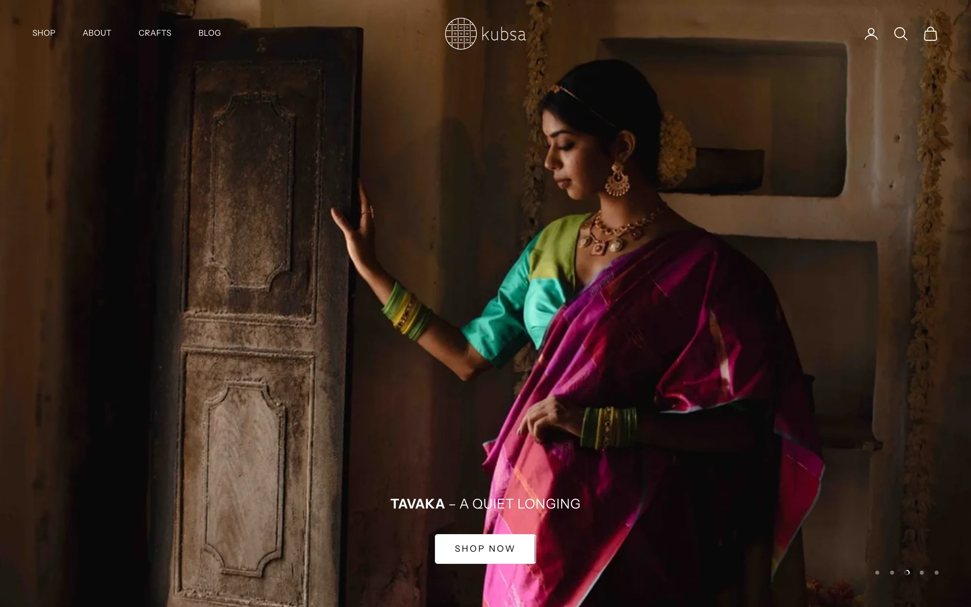 The Kubsa homepage: a woman in a magenta handwoven saree against a carved wooden door, with the collection name Tavaka and a Shop now button